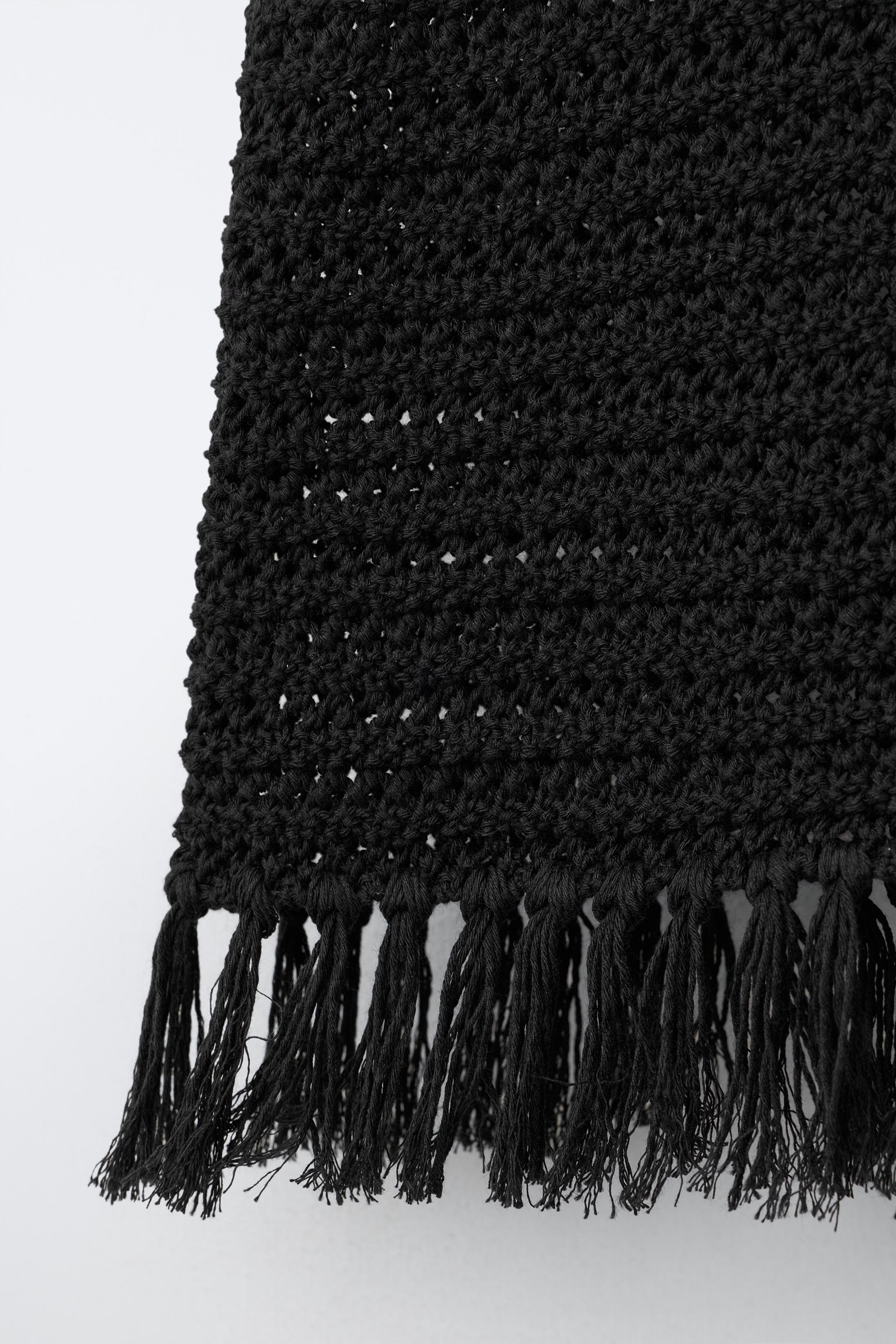 TOP EN MAILLE À FRANGES